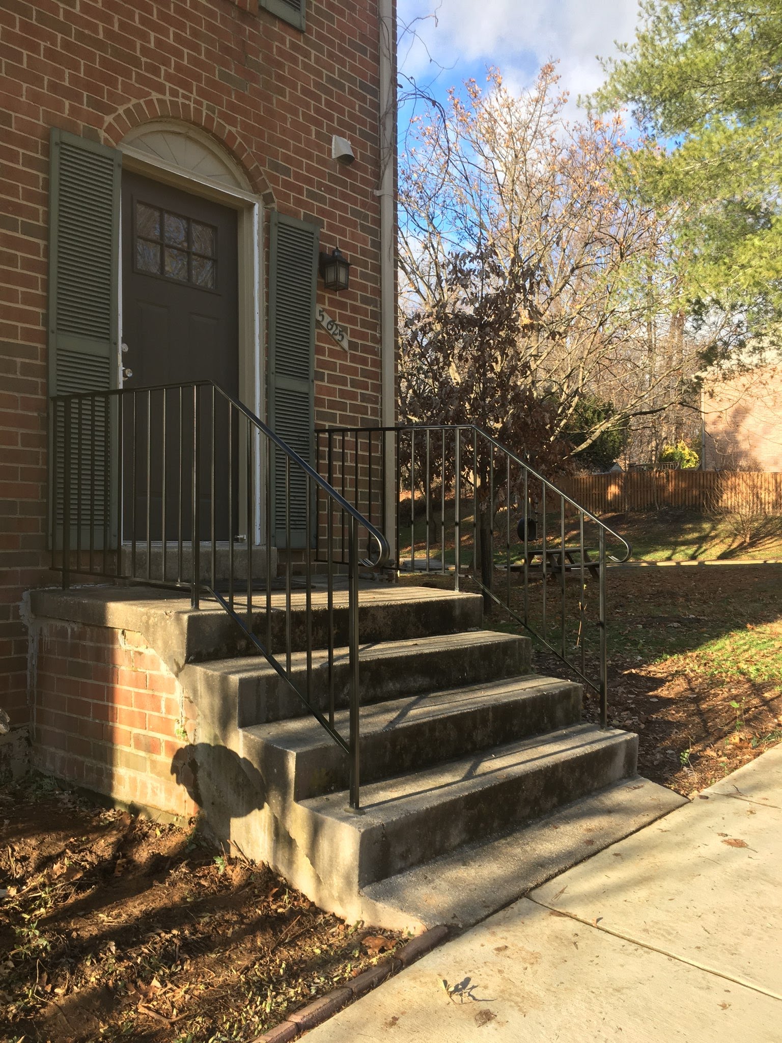 Iron Railings with pickets installed at the main entrance of a home in Rockville, MD.