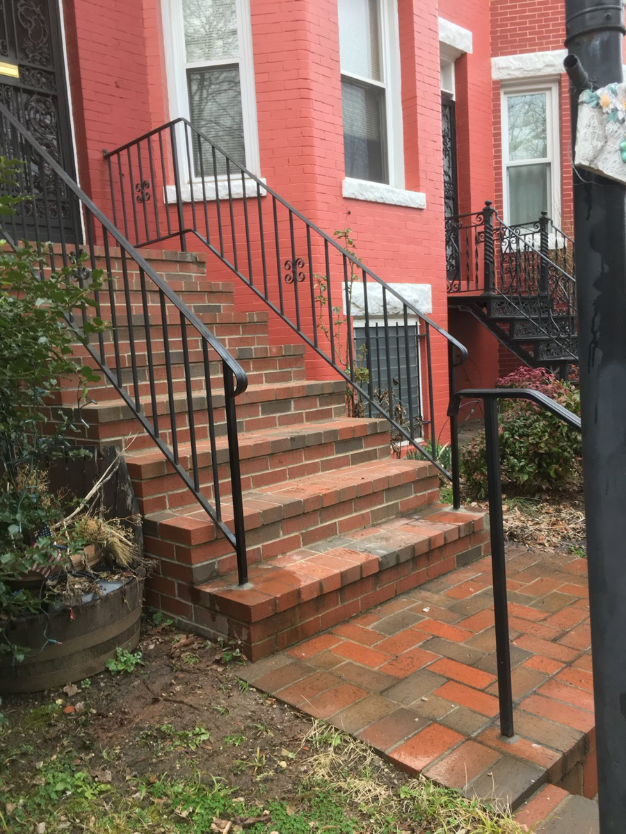 Iron Rails with pickets installed infront of a house in Northwest, DC